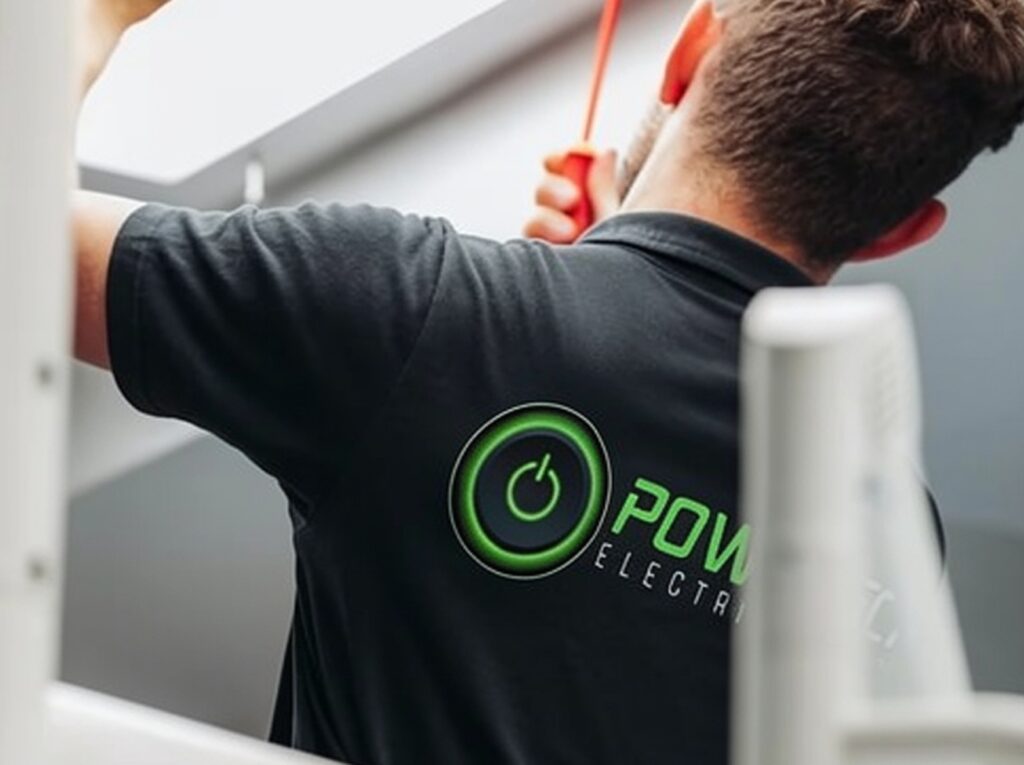 electrician working with ladder and tools in hand | GPS: -33.872234, 151.202245